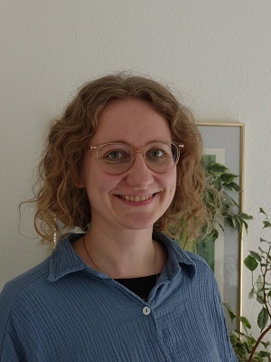 E. Wolf